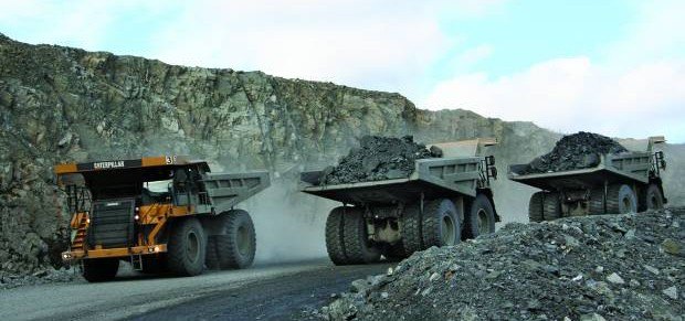 Ore and waste-rock is transported out of the open pit at the gold-mine in Kittlä. To get 1 ton of ore 9 tons of waste has been removed.  Annually 10 million tons are brought out of which 1 million goes to the mill. After processing some 5000 kilos (250 liters) of gold is the net product. Photo: Odd Iglebaek